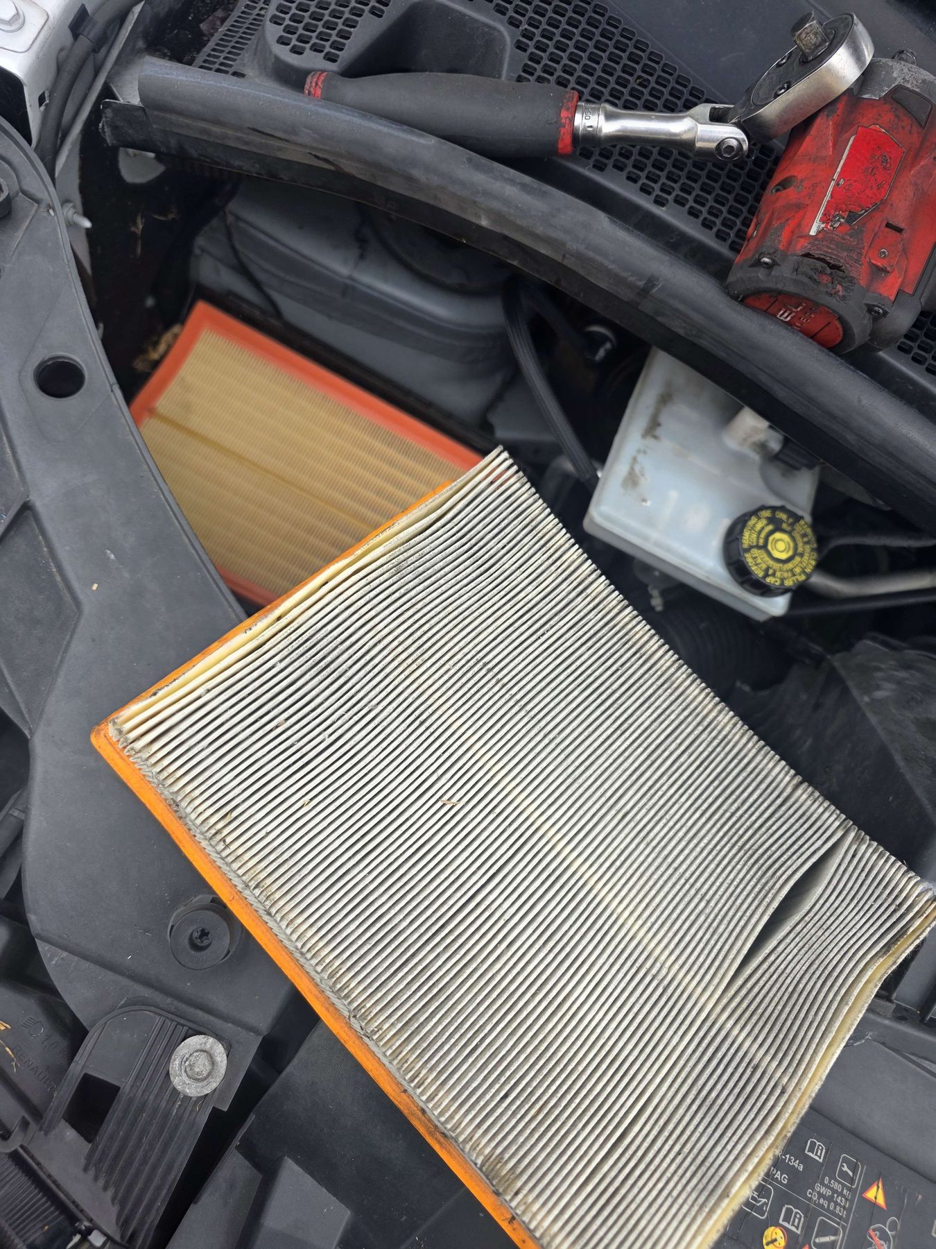 A clogged air filter replaced with new